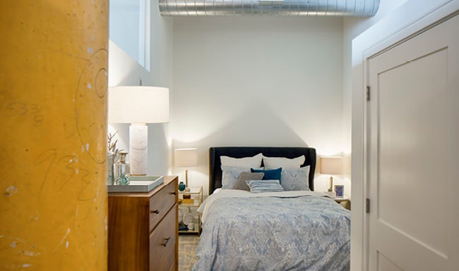 Bedroom with natural lighting and high ceilings Bedroom with natural lighting and high ceilings